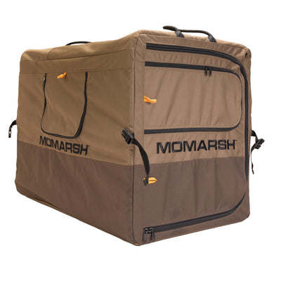 The MOmarsh Inc. Quick Crate is a large, brown and tan soft-sided dog crate with black zippers, handles, and "MOmarsh" printed in black on two sides—ideal for easy, portable pet transport.